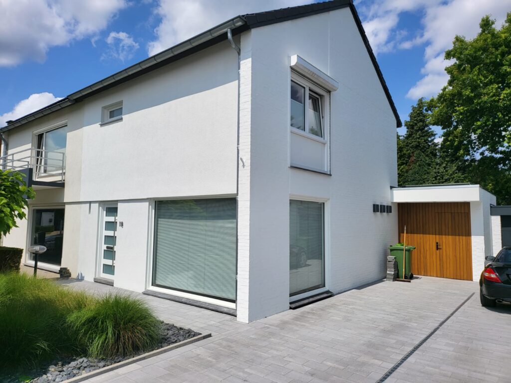 buitenkant woning laten spuiten